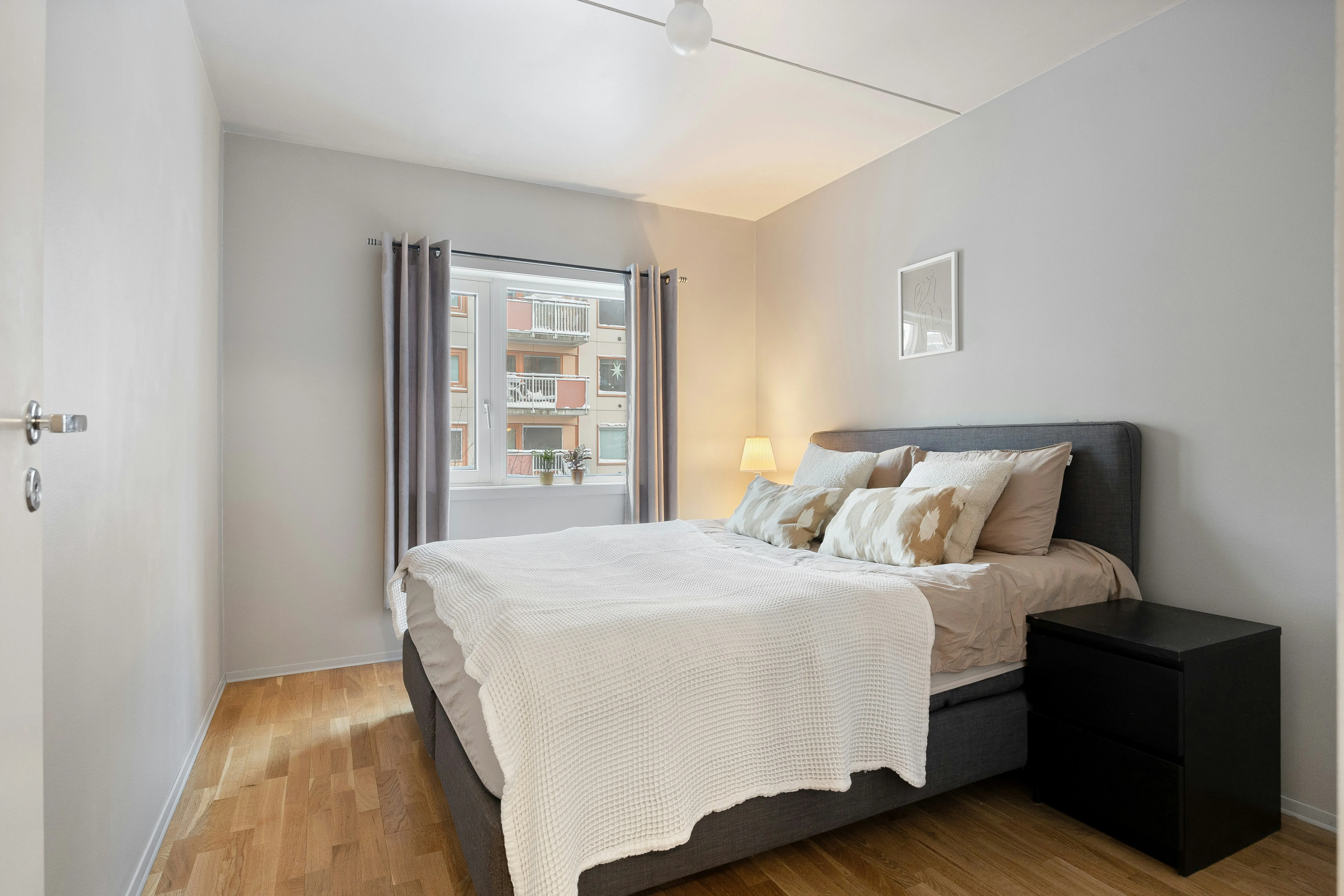 Before: A different bedroom decorated in the Scandinavian style, walls and furniture untouched