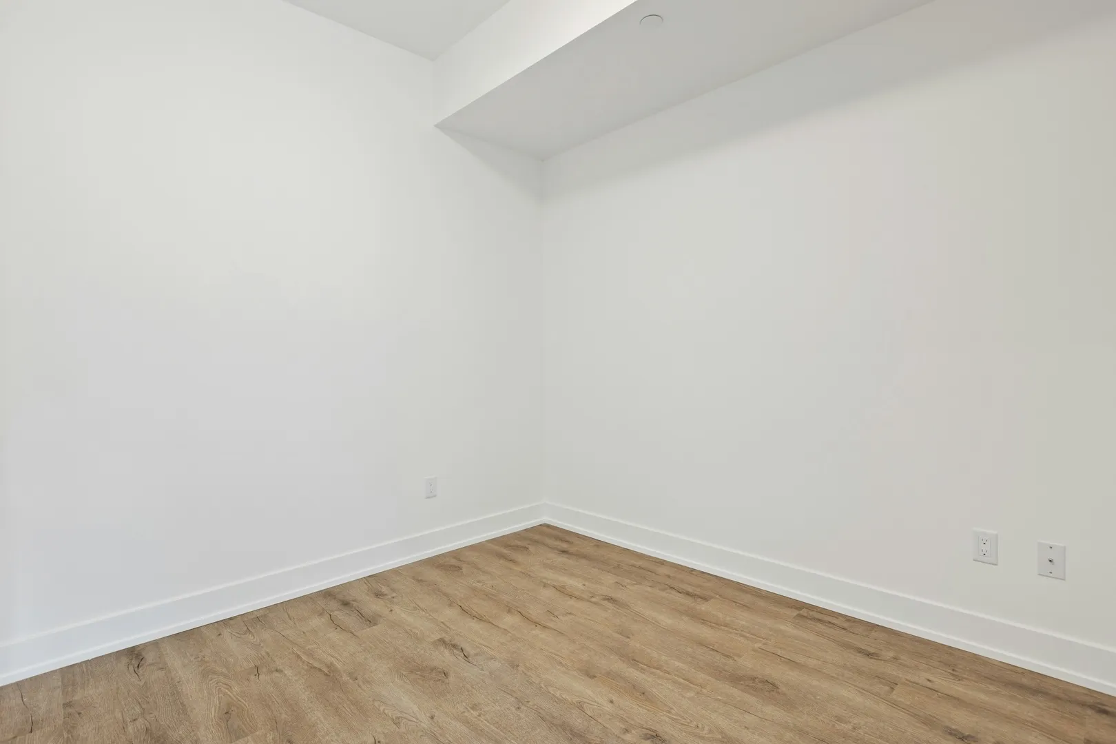Before: AI staging for an empty bedroom photo